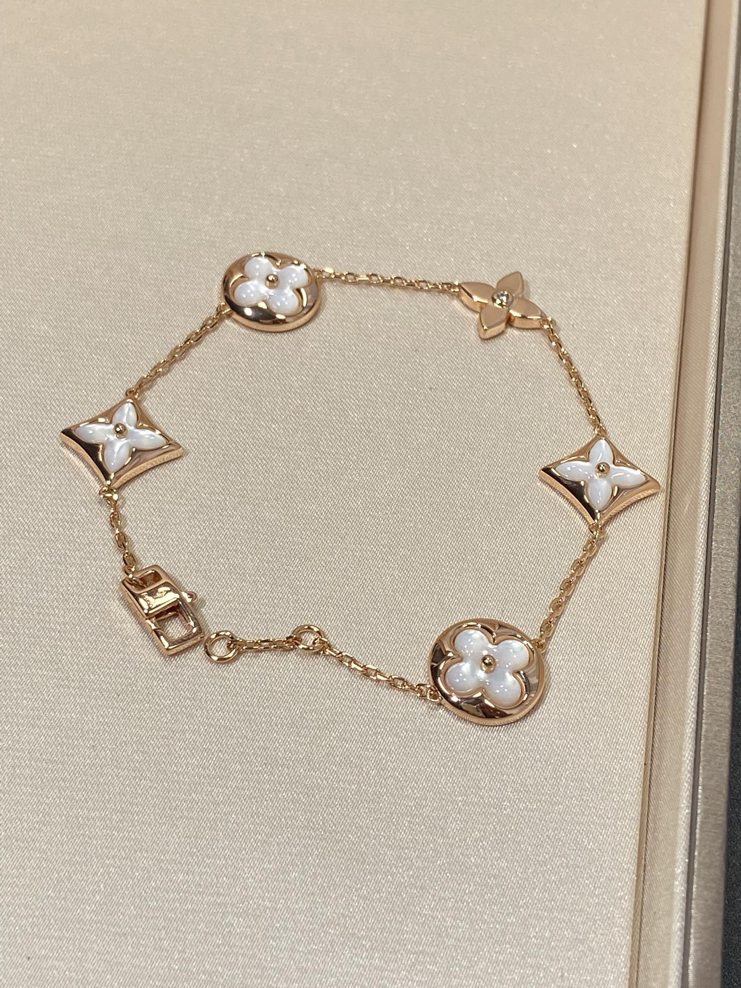 Miro STAR AND SUN 5 MOTIF MOP PINK GOLD BRACELET